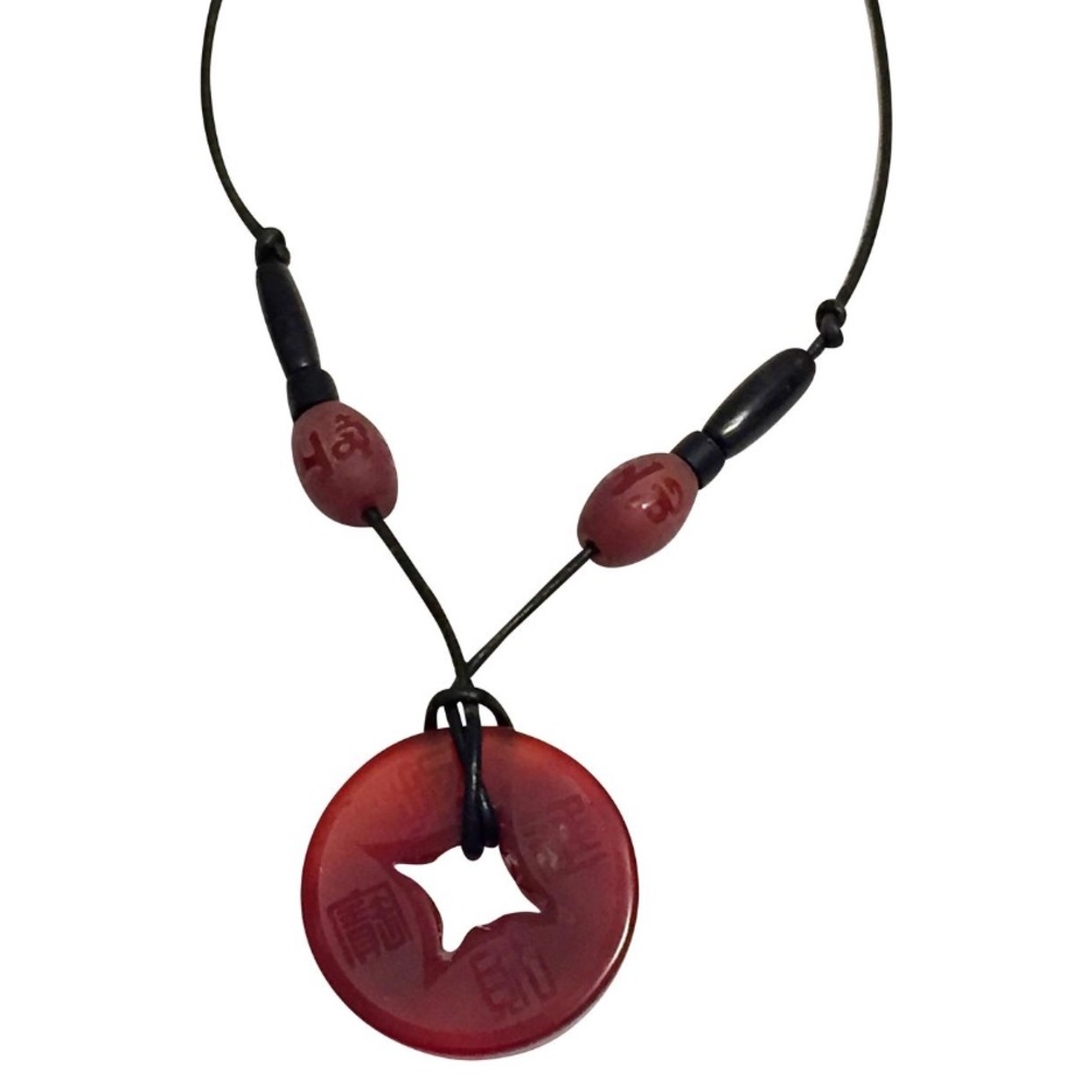Vintage leather cord carved gemstone necklace